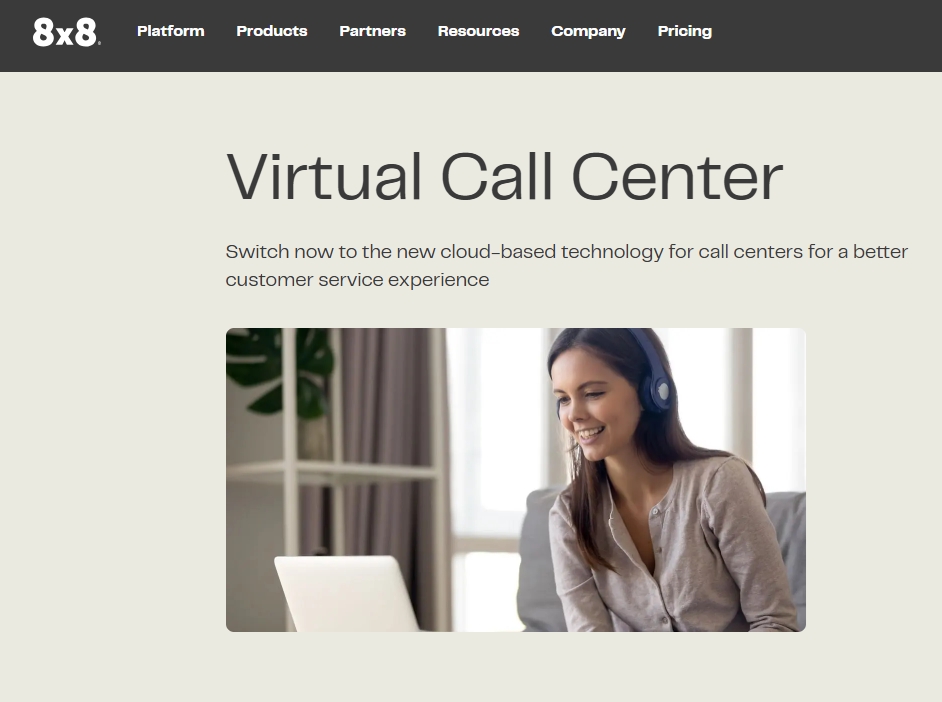 Smiling woman using headset with 8x8 virtual call center software on laptop